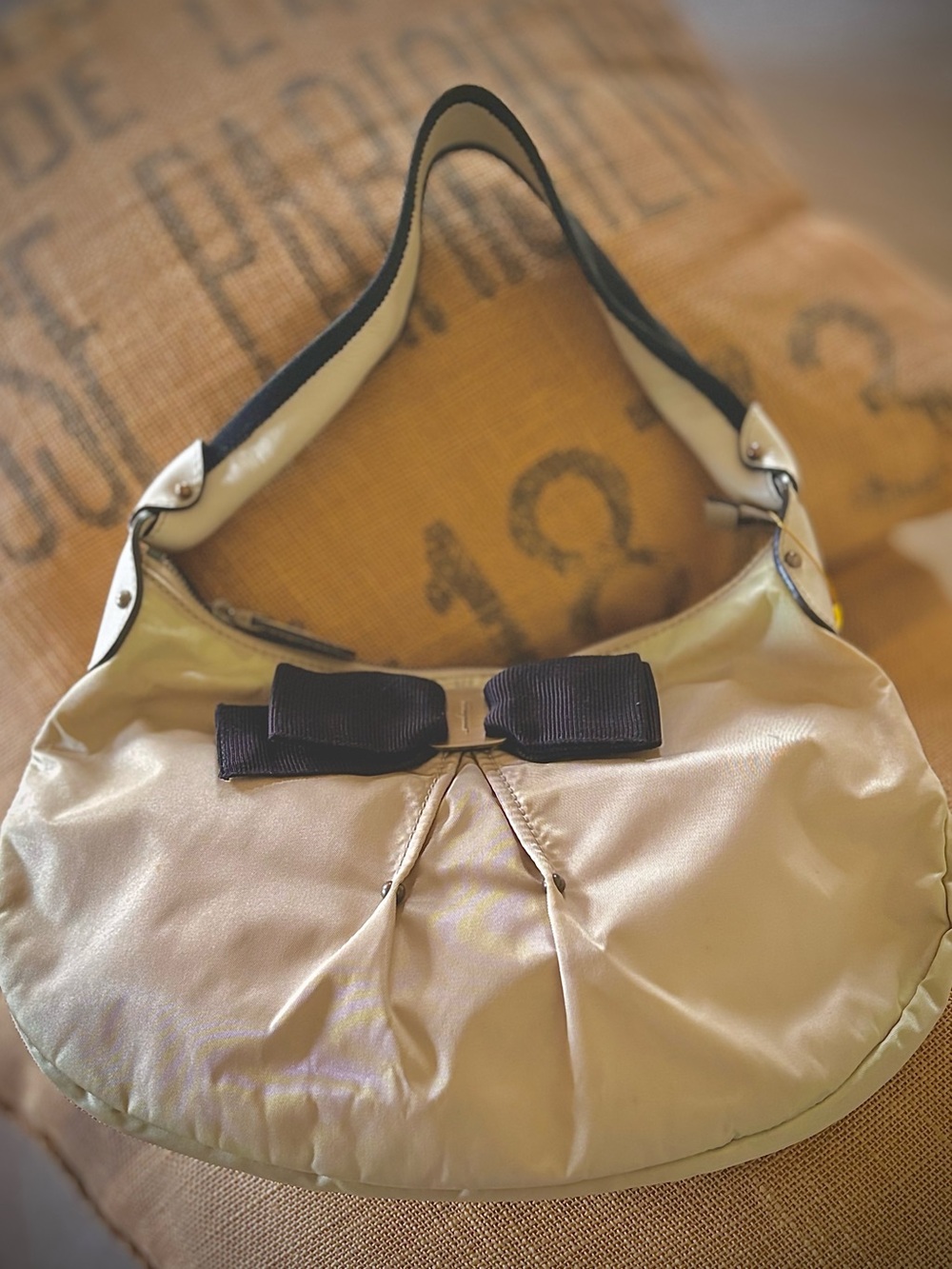 Salvatore Ferragamo Cream Satin Shoulder Bag with classic Black Bow.